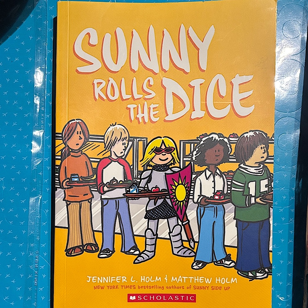 Scholastic Graphic Novel- “Sunny Rolls the Dice” - Yellow